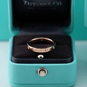 Tiffany & Co. Gold Band with Silver Details
